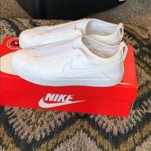White Nike Slip-ons